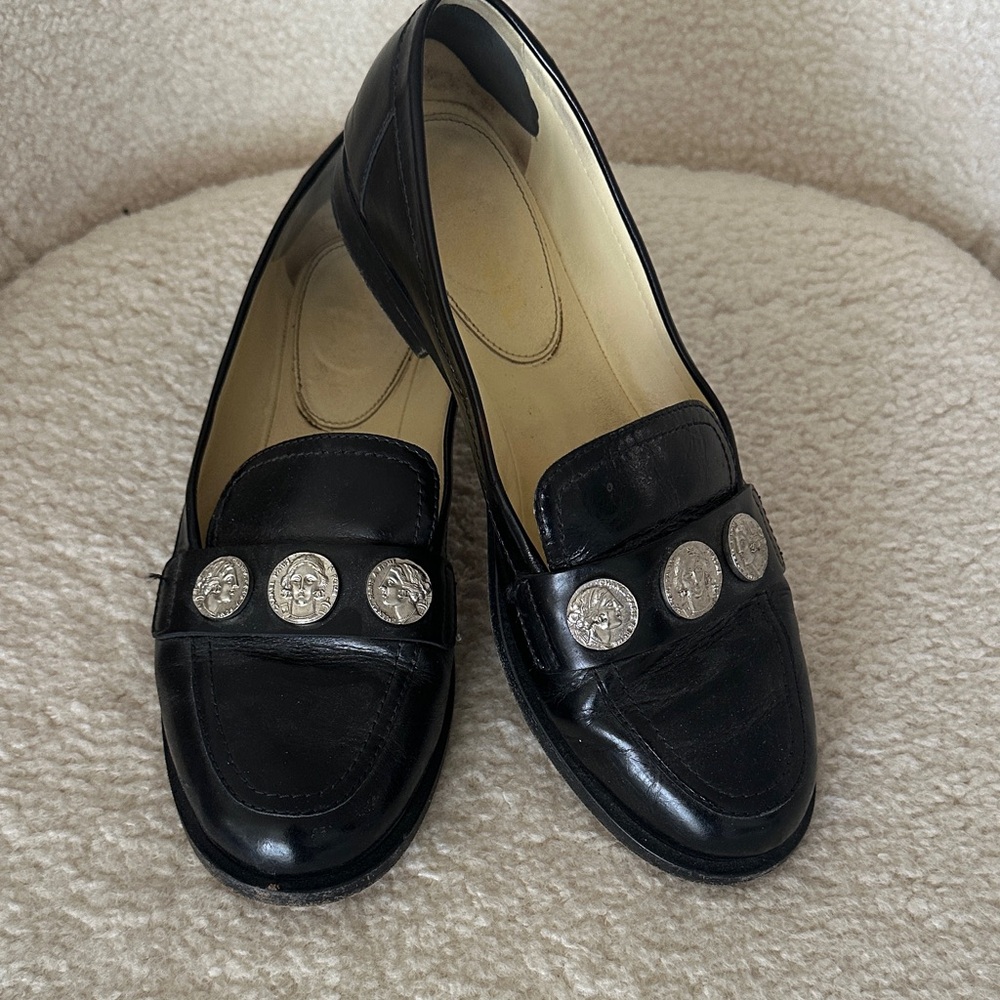 CHANEL Black Loafers with Silver Coin Accents